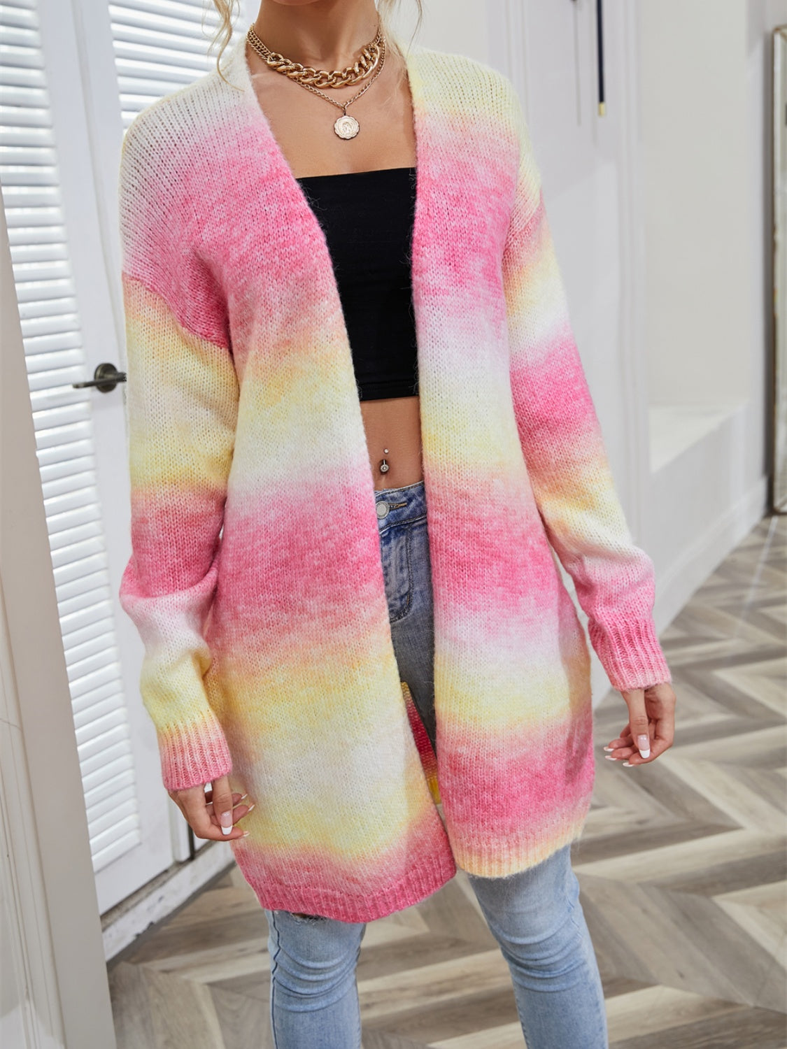Rainbow gradient longline knit cardigan with open front and long sleeves, in Blush Pink and Yellow Green.