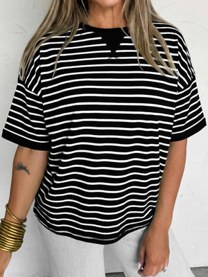Black and white striped ribbed half sleeve tee with crew neck and boxy fit.