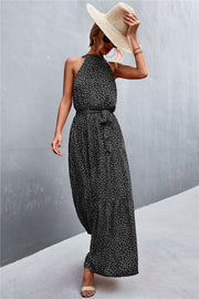 Black floral print maxi dress with halter neckline and tie waist