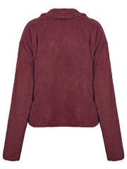 Burgundy faux fur biker jacket with a collared neckline and long sleeves.