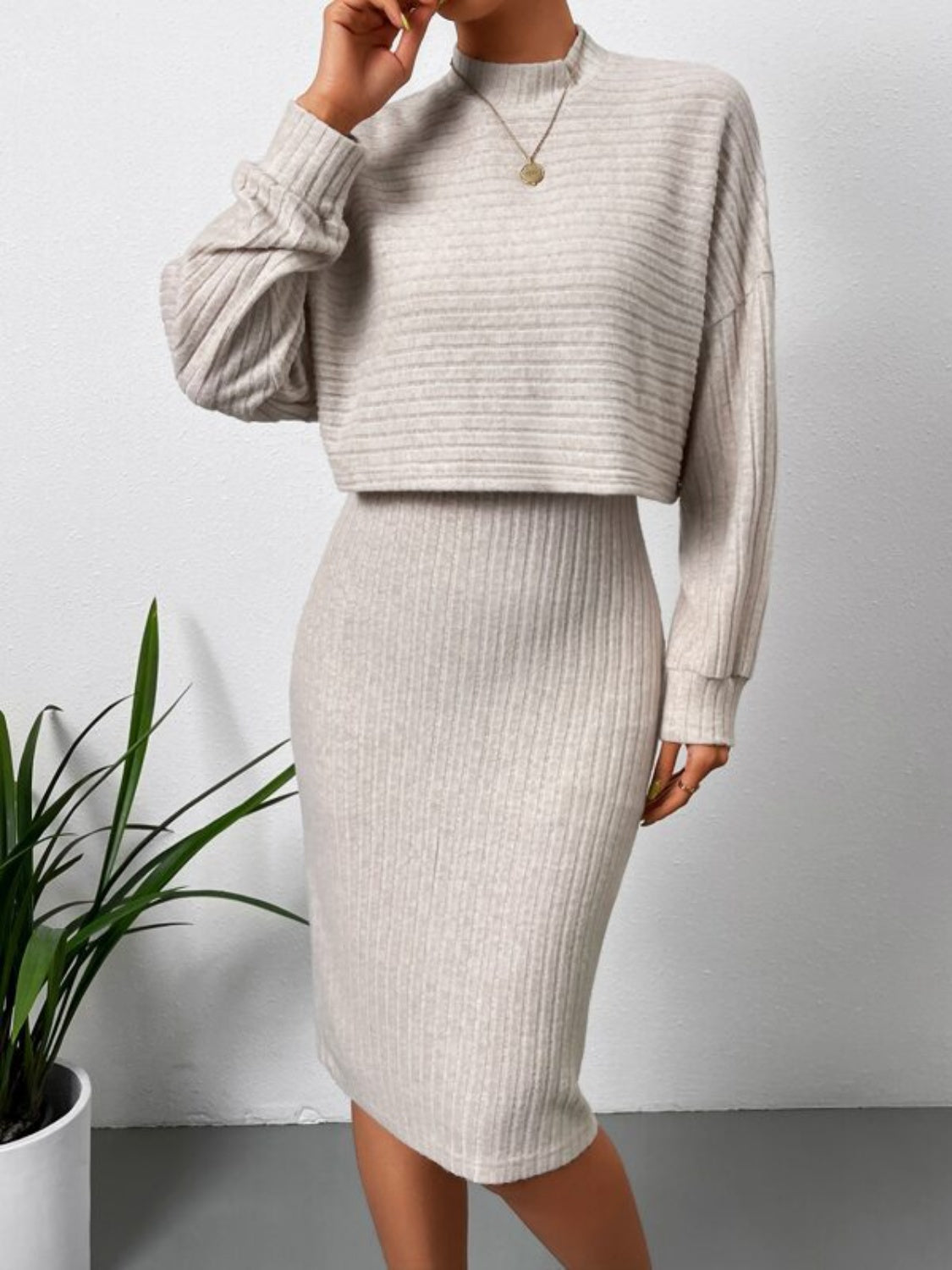 Ribbed knit co-ord set in Dust Storm, featuring a cropped mock neck sweater and a midi pencil skirt.