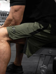 Performance panel shorts in Army Green or Black, breathable, casual activewear.