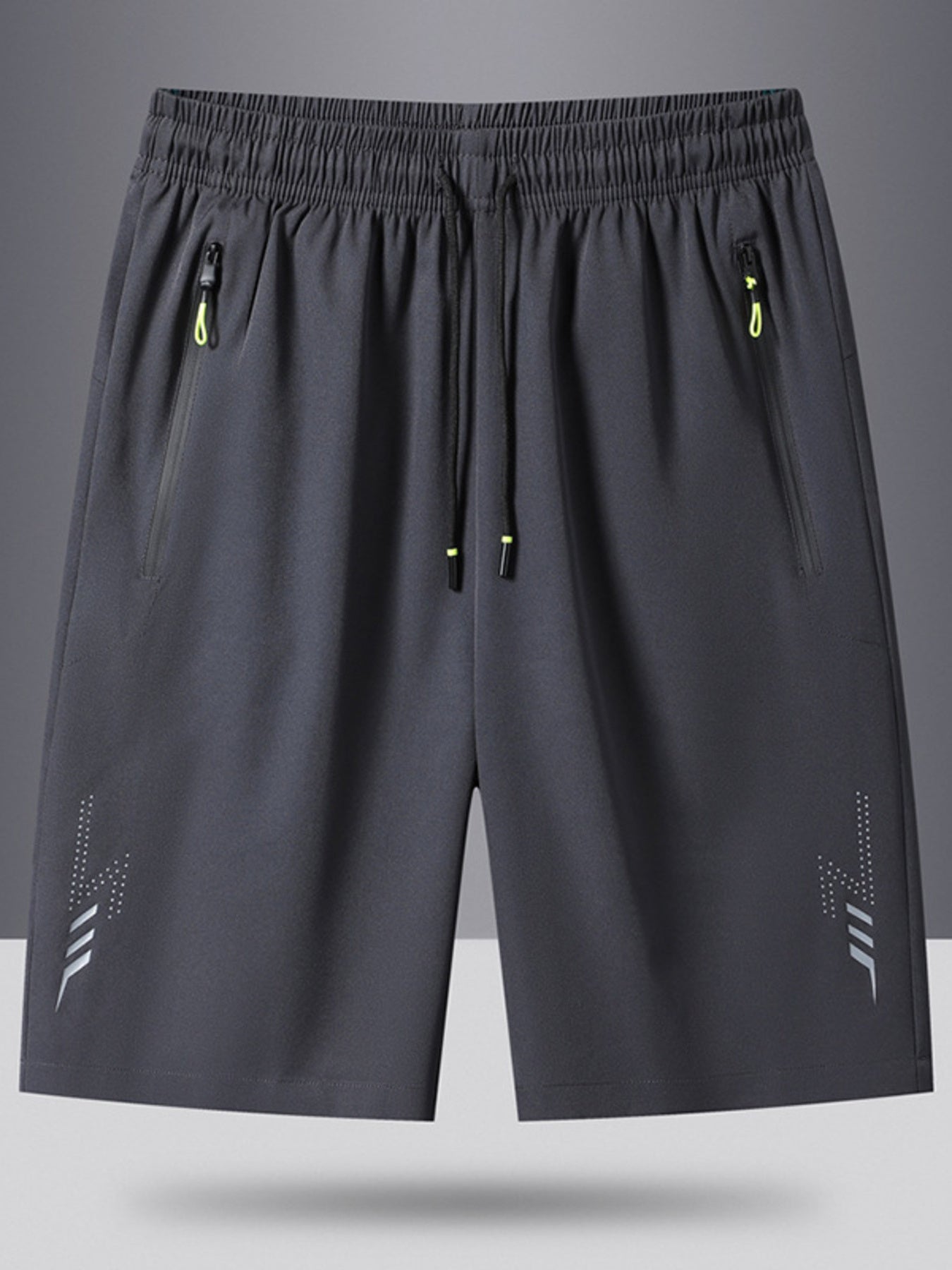 Men's grey drawstring athletic shorts with zippered pockets and reflective detail.