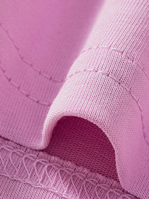 Pink cotton toddler t-shirt with detailed stitching and crew neck fabric detail.