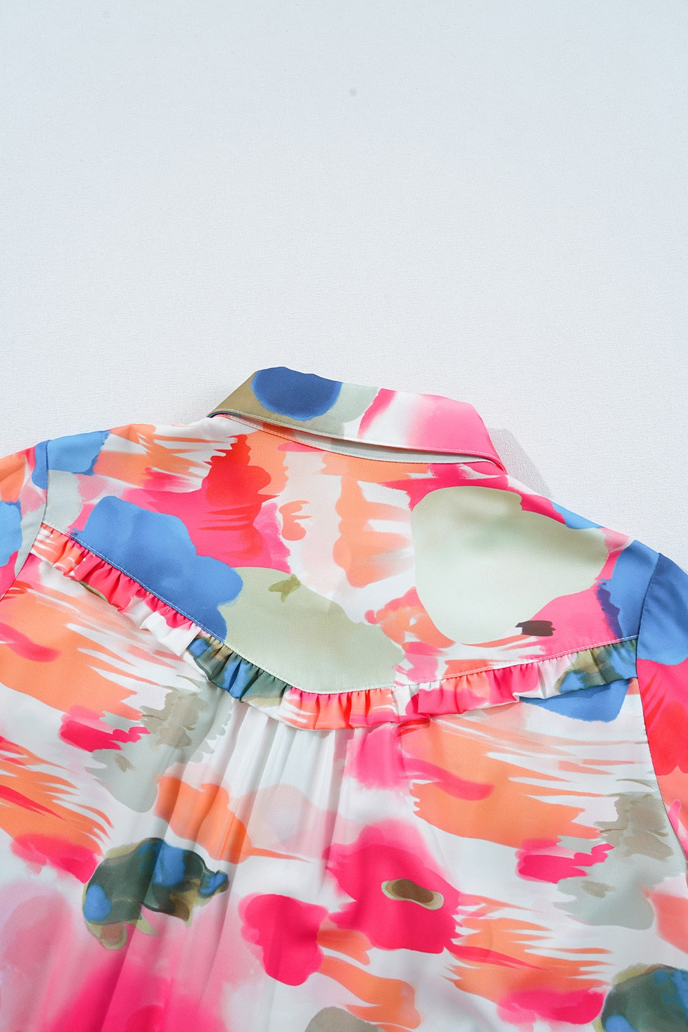 Pink abstract painterly blouse with ruffle front detail