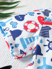 Toddler cotton shirt and shorts set with nautical print in blue and red.