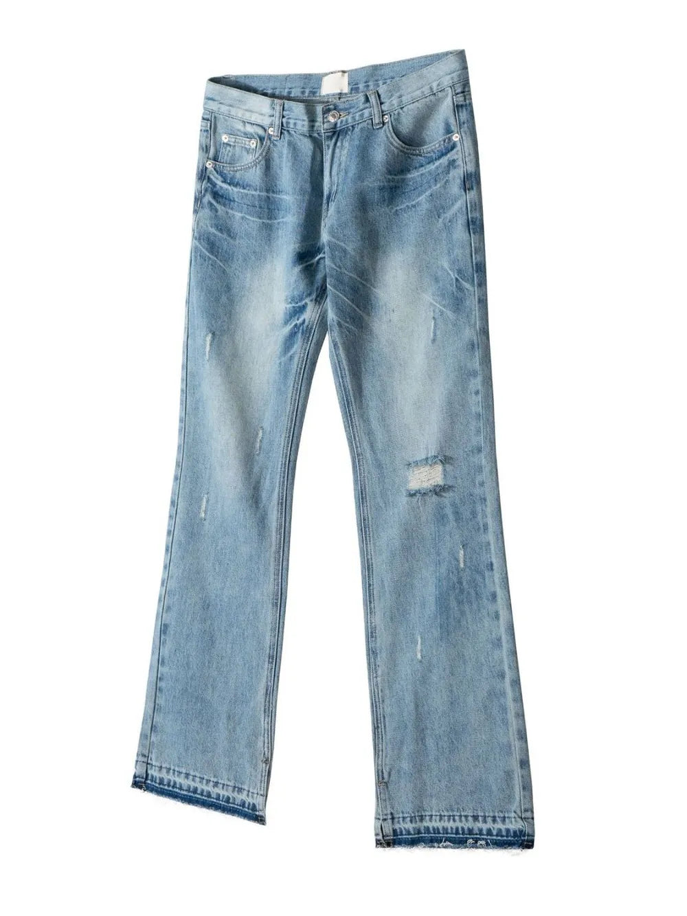 Split-hem distressed denim jeans in medium wash with raw hem detail.