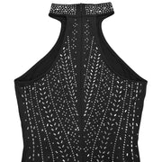 Black halter neck romper with allover rhinestone embellishments and a high neckline.