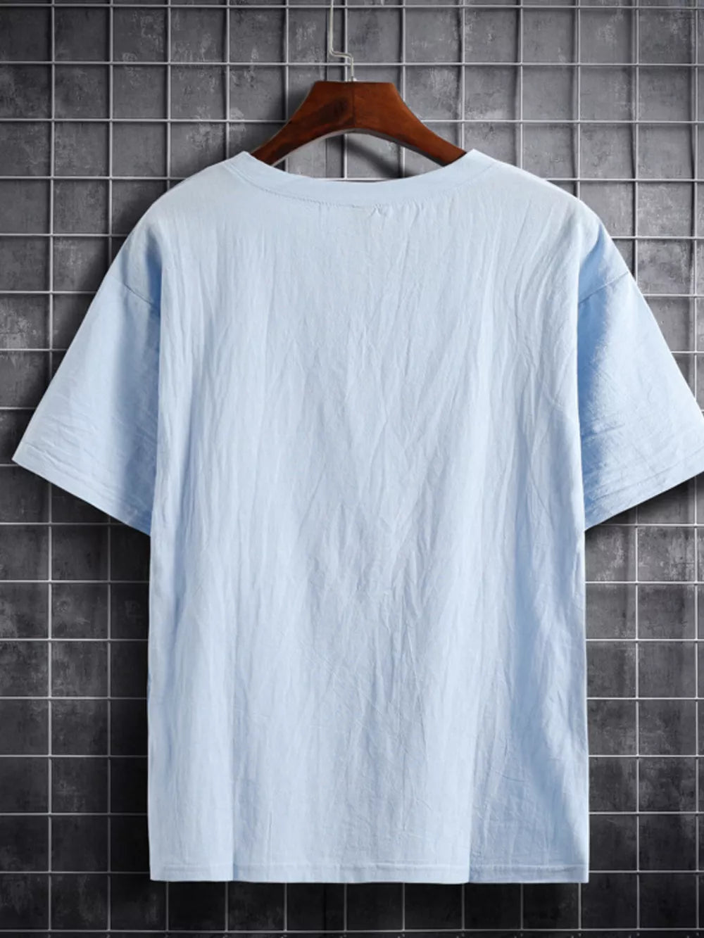 Light blue cotton crew neck t-shirt with short sleeves, shown from the back.