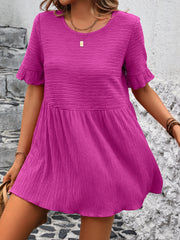 Textured babydoll blouse in magenta with flutter sleeves and a tiered skirt.