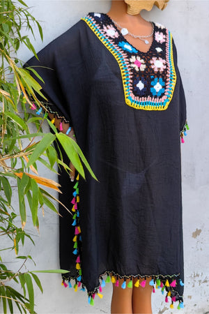 Black kaftan dress with colorful crochet yoke and tassel trim
