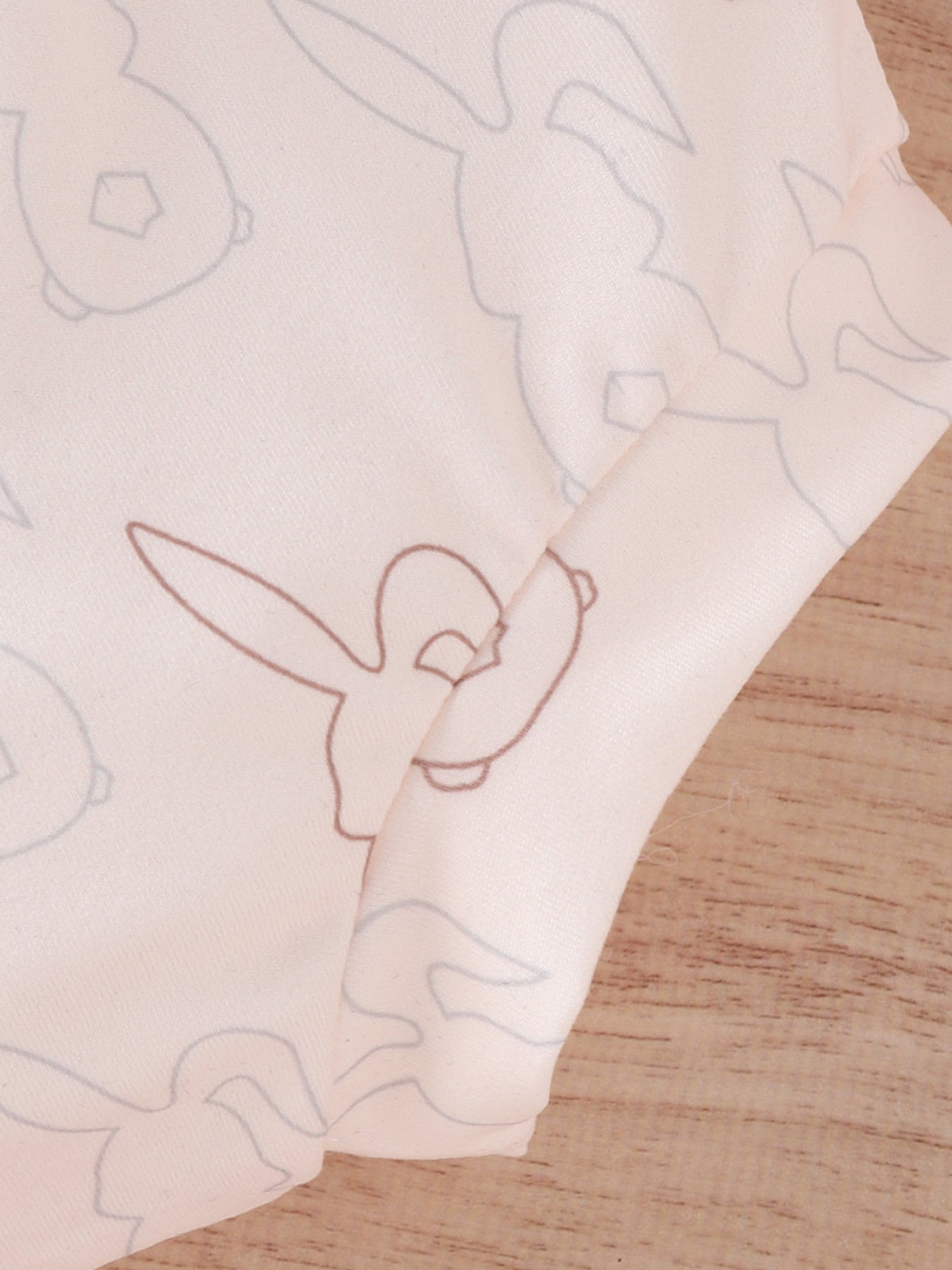 Hunny Bunny graphic baby set in pale pink with outline bunny print.