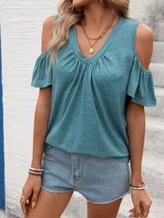 Blue-green ruched cold shoulder t-shirt with V-neck and flutter sleeves.