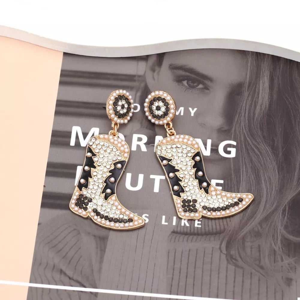 Dazzling cowboy boot earrings with pearls and black and white details.