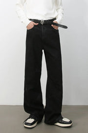 Faded black wide-leg denim jeans with a casual, baggy fit.