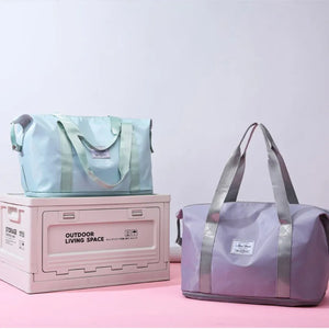Weekend Escape Nylon Tote in Dusty Blue and Vivid Violet with grey handles