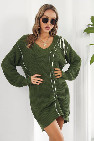Army green V-neck acrylic sweater dress with white stitch detail and tie accents.