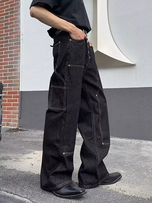 Classic vintage wide leg jeans in dark wash cotton with contrast stitching and multiple pockets.