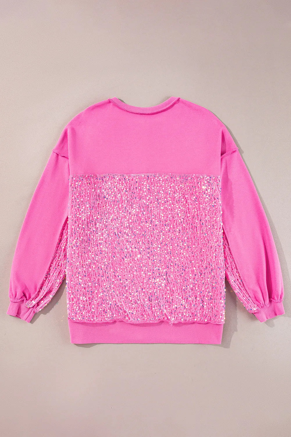 Fuchsia pink sweatshirt with sequin panel detail and crew neck.