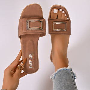 Brown buckle decor open toe slide sandals with "FASHION" text on sole.