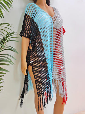 Colorblock crochet cover-up with fringe in black, blue, and gray.