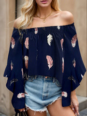 Off-shoulder dark blue blouse with feather print and flounce sleeves.