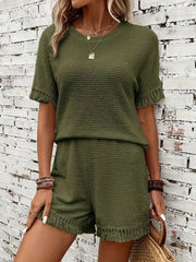 Moss textured knit set with fringe detail on short sleeves and hem.