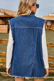 Distressed denim sleeveless vest in dark wash with frayed hem and armholes.
