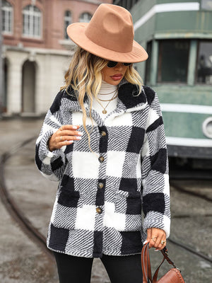 Textured plaid teddy button-up jacket in black and white with button details and pockets.