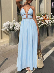 Blue striped halter maxi dress with brown trim and a-line skirt.