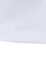 White cotton undershirt with textured fabric and visible stitching detail.