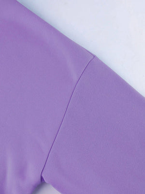 Lilac hoodie sleeve detail showing seam and textured fabric