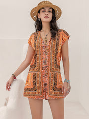 Bohemian print cap-sleeve playsuit in orange with button details and V-neck.