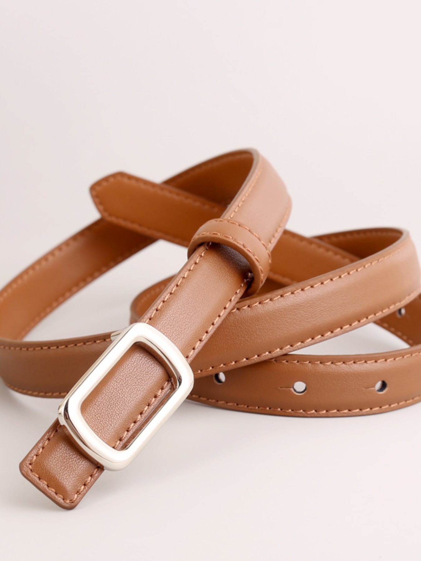 Caramel leather skinny belt with silver buckle detail
