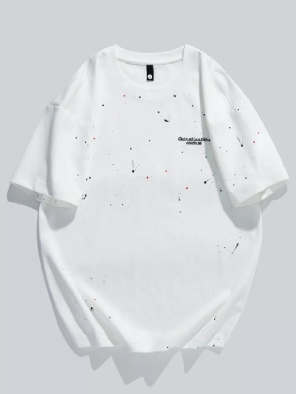 White cotton t-shirt with black and red paint splatter detail and graphic text.
