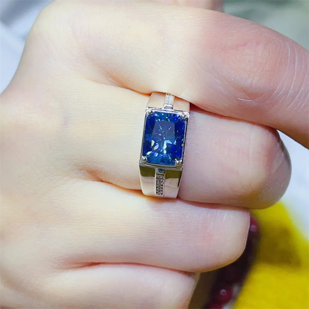 Men's blue emerald cut moissanite signet ring with diamond accents