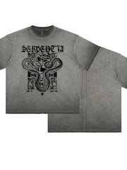 Washed gray oversized graphic tee with serpent and skull design.