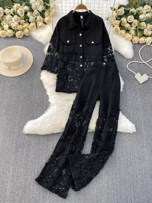 Black lace-embellished two-piece set with collared button-up jacket and wide-leg pants.