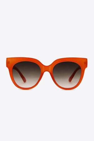 Sunset cat-eye sunglasses in deep red with gradient lenses