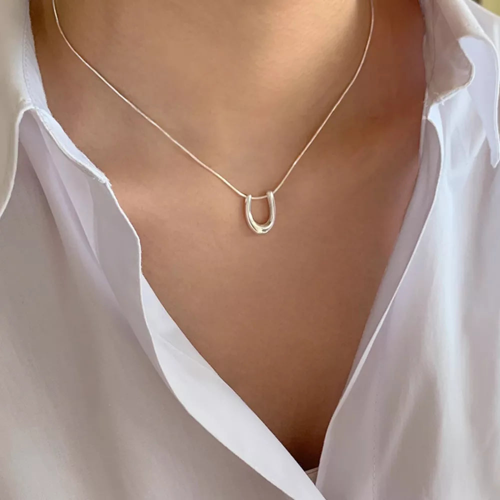 Sterling silver U-shaped pendant necklace with delicate chain