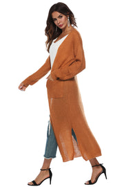 Longline knit cardigan in Caramel with side slits and pockets.