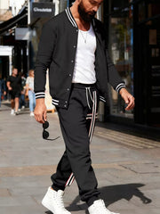 Men's black tracksuit set with white stripes on jacket sleeves and pants.