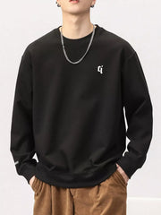 Black cotton blend sweatshirt with round neck and small white logo detail on chest.
