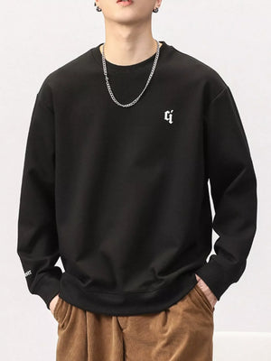 Black cotton blend sweatshirt with round neck and small white logo detail on chest.