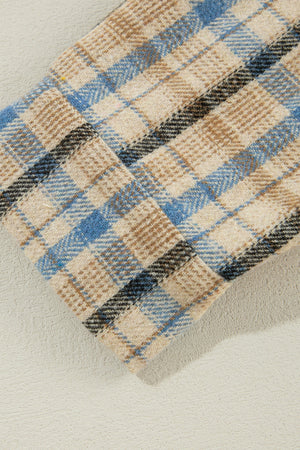 Textured plaid hooded overshirt with raw hem in plaid pattern.