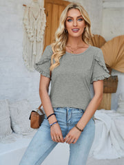 Gray t-shirt with ruffled short sleeves and a crew neck.