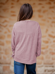 Dusty Pink waffle knit relaxed fit crewneck top with long sleeves.