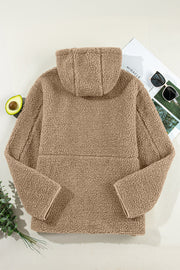 Sherpa-lined hooded jacket in brown with contrast trim and hood detail.