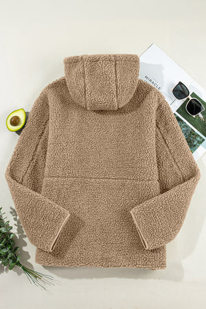 Sherpa-lined hooded jacket in brown with contrast trim and hood detail.