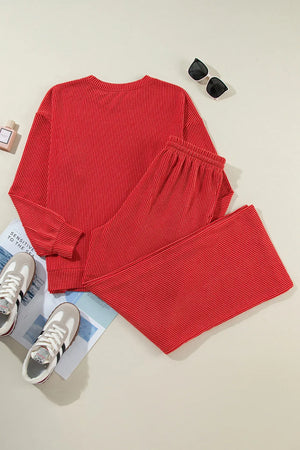 Deep Red ribbed knit loungewear set with crew neck top and wide leg pants.